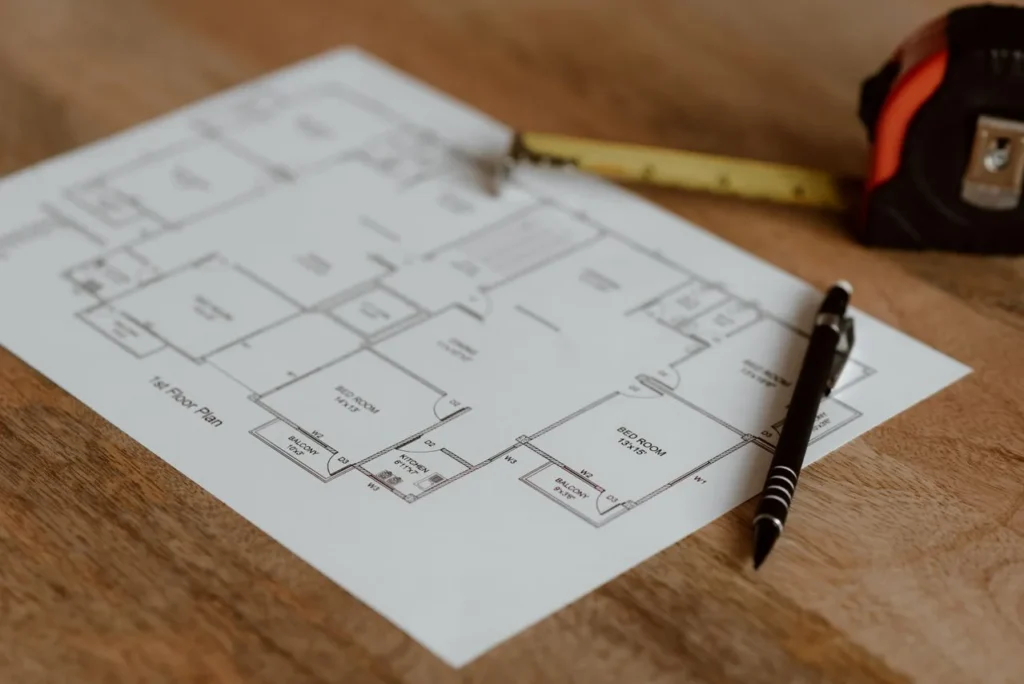 tekening huis rolmaat en potlood