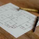tekening huis rolmaat en potlood